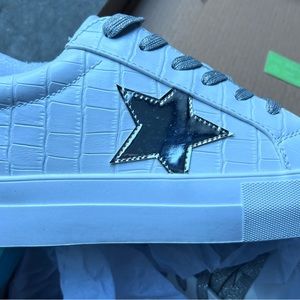 Brand New never been worn, first time taken out of box, white sneakers size 8.5